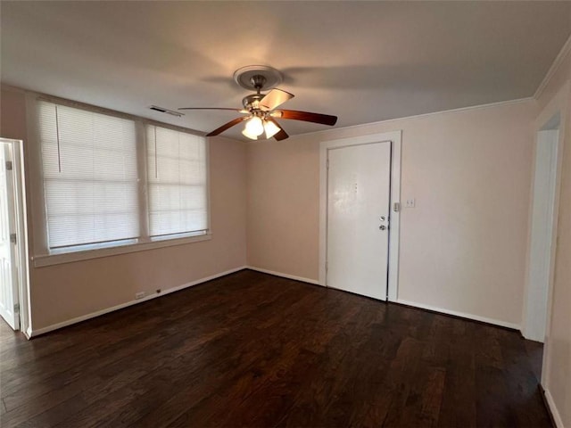 35 Elmwood St, Rome, GA 30161 - spare room with visible vents, baseboards, ceiling fan, dark wood finished floors, and crown molding