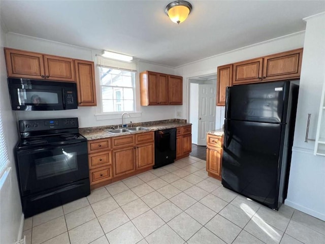 35 Elmwood St, Rome, GA 30161 - kitchen with a sink, brown cabinetry, black appliances, and crown molding