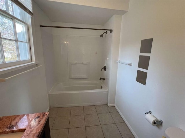 35 Elmwood St, Rome, GA 30161 - full bath featuring toilet, tile patterned flooring, baseboards, and tub / shower combination