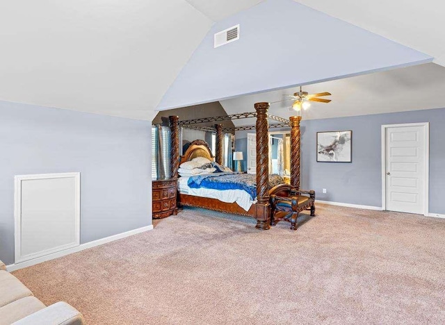 bedroom with lofted ceiling, baseboards, visible vents, and carpet flooring