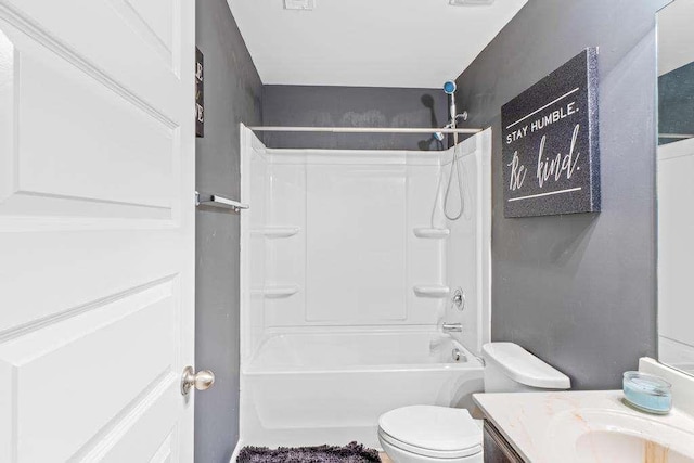 full bath with vanity, toilet, and bathing tub / shower combination