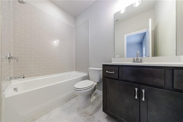 full bath featuring vanity, visible vents, toilet, baseboards, and washtub / shower combination