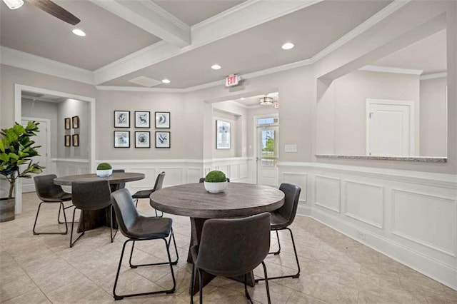 dining space featuring ceiling fan, beamed ceiling, light tile patterned floors, and ornamental molding