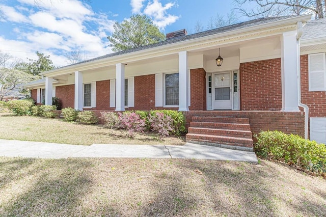 3390 Somerset Trl SW, Atlanta, GA 30331 - single story home with brick siding, a porch, and a front yard