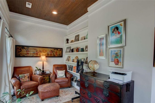 living area with built in features, wood ceiling, and brick wall