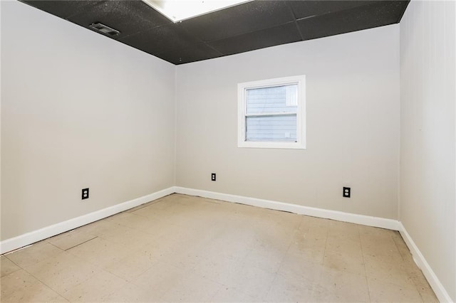 empty room with baseboards