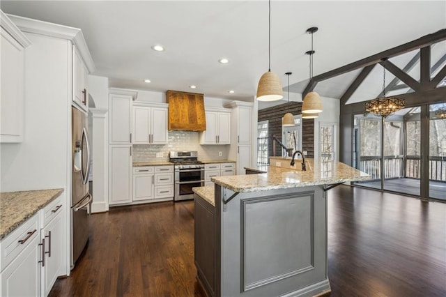 8625 Anchor On Lanier Ct, Gainesville, GA 30506 - kitchen featuring stainless steel appliances, custom range hood, dark wood finished floors, a chandelier, and tasteful backsplash
