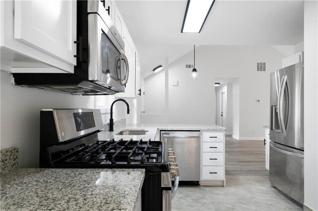 1031 Abercorn Way, Douglasville, GA 30134 - kitchen featuring appliances with stainless steel finishes, visible vents, white cabinets, and a sink