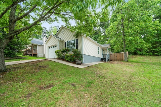1031 Abercorn Way, Douglasville, GA 30134 - view of property exterior featuring a lawn, driveway, and a garage