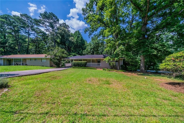 3904 W Hilda Cir, Decatur, GA 30035 - view of front of property with driveway and a front lawn