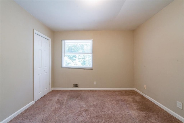 3904 W Hilda Cir, Decatur, GA 30035 - carpeted empty room featuring baseboards