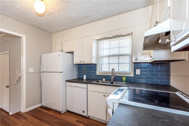 kitchen featuring white cabinetry, sink, white appliances, and dark hardwood / wood-style flooring