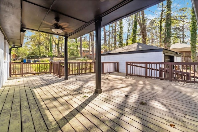 2267 Bryant Dr, East Point, GA 30344 - wooden terrace with ceiling fan and an outbuilding