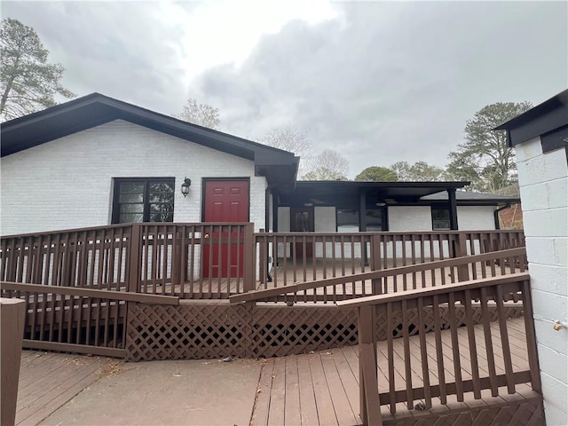2267 Bryant Dr, East Point, GA 30344 - back of house featuring brick siding and a deck