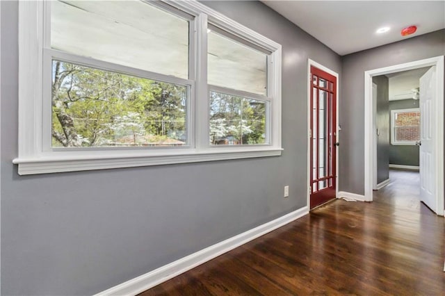 2267 Bryant Dr, East Point, GA 30344 - foyer entrance featuring baseboards and dark wood-style floors