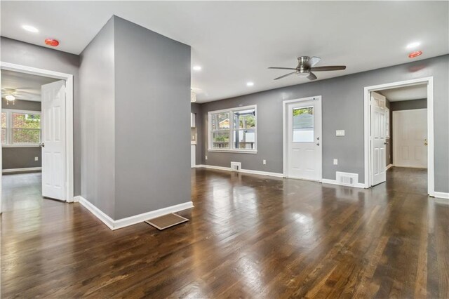 2267 Bryant Dr, East Point, GA 30344 - unfurnished living room with visible vents, ceiling fan, and a wealth of natural light