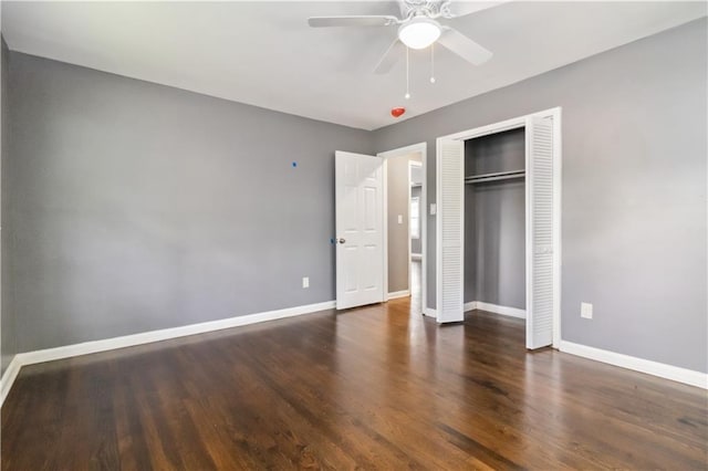 2267 Bryant Dr, East Point, GA 30344 - unfurnished bedroom with baseboards, ceiling fan, wood finished floors, and a closet