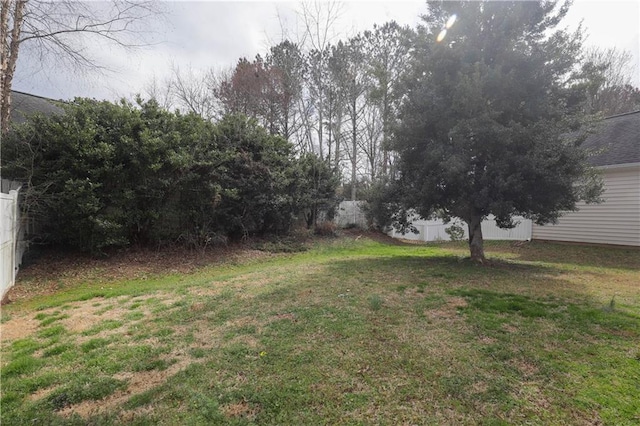 view of yard featuring fence