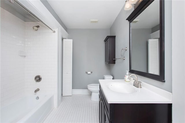 bathroom featuring visible vents, tile patterned flooring, vanity, toilet, and tub / shower combination