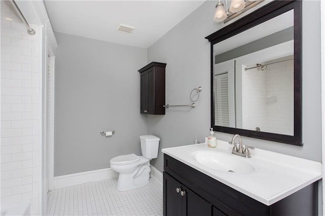 bathroom with visible vents, tile patterned flooring, vanity, baseboards, and toilet
