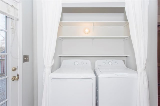 laundry room featuring separate washer and dryer