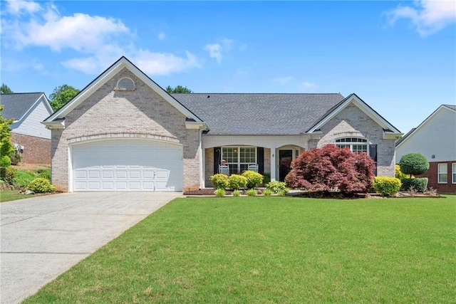 609 Grand Ashbury Ln, Sugar Hill, GA 30518 - view of front of house featuring brick siding, concrete driveway, an attached garage, and a front lawn