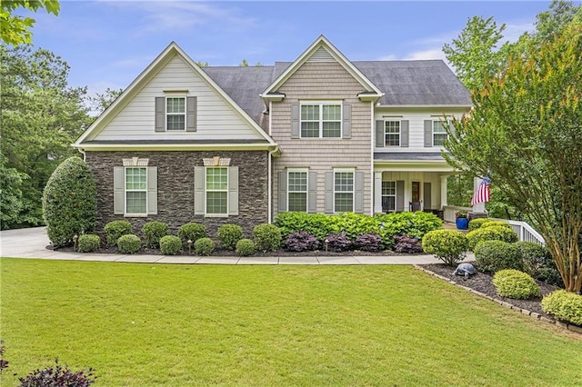1546 Heritage Pass, Milton, GA 30004 - view of front of home with a front yard and stone siding