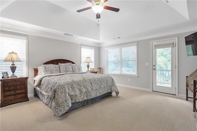 1546 Heritage Pass, Milton, GA 30004 - bedroom featuring a tray ceiling, access to exterior, carpet, baseboards, and a ceiling fan