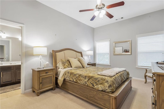 1546 Heritage Pass, Milton, GA 30004 - bedroom with light carpet, baseboards, ensuite bath, and ceiling fan