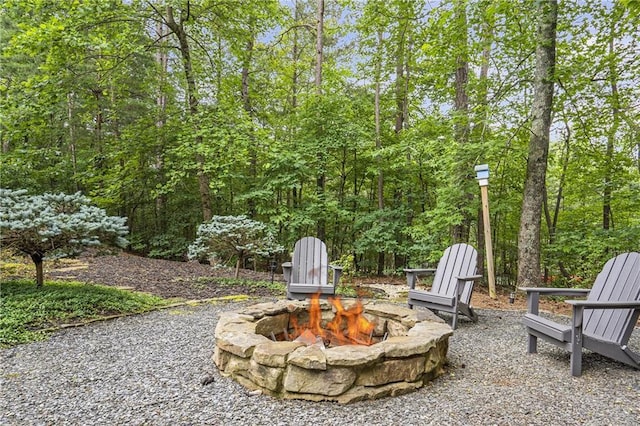 1546 Heritage Pass, Milton, GA 30004 - view of patio featuring an outdoor fire pit