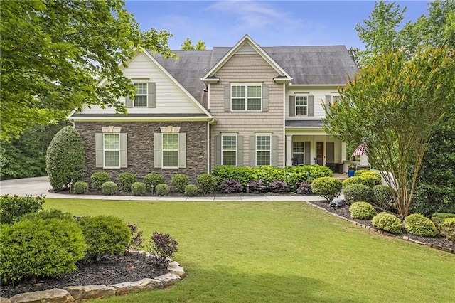 1546 Heritage Pass, Milton, GA 30004 - view of front of home featuring a front lawn and stone siding