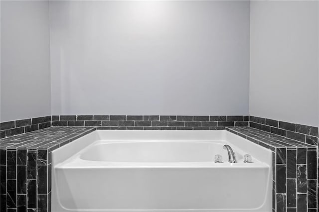 full bath featuring a garden tub