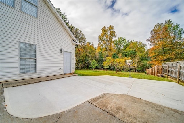 view of patio featuring fence