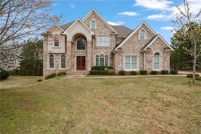 4402 Income Cir, Ellenwood, GA 30294 - view of front of house featuring a front lawn and brick siding