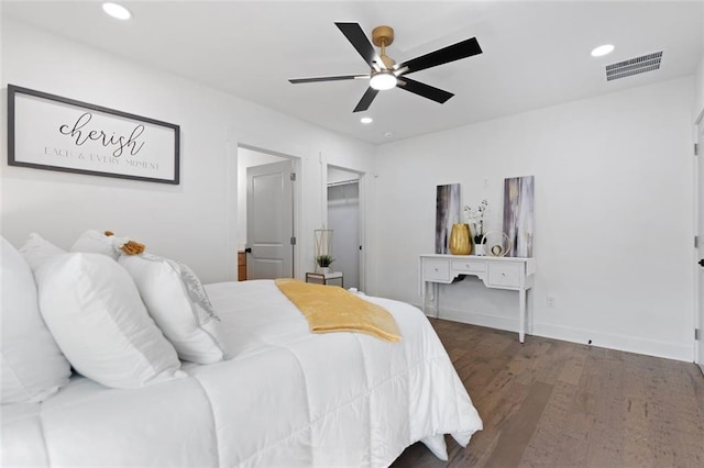 bedroom with dark wood-style flooring, recessed lighting, and ceiling fan