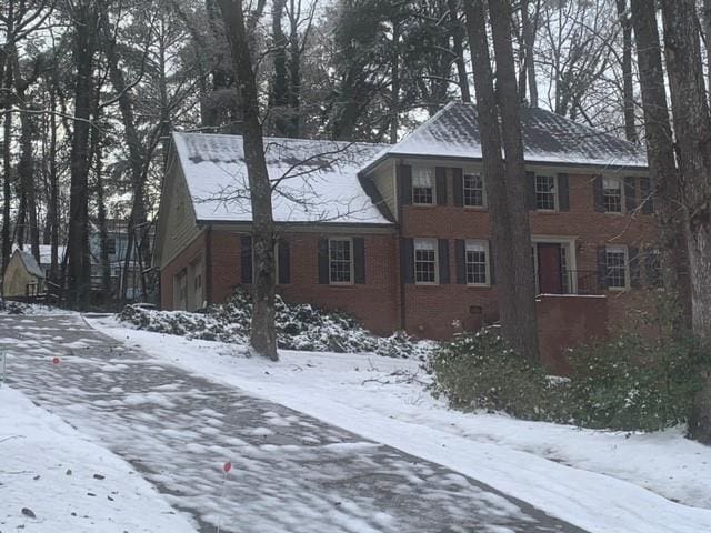 view of snow covered property