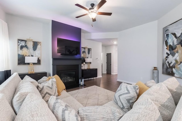 4824 Sultana Way SW, Atlanta, GA 30331 - living room with a ceiling fan, a fireplace with flush hearth, baseboards, and wood finished floors