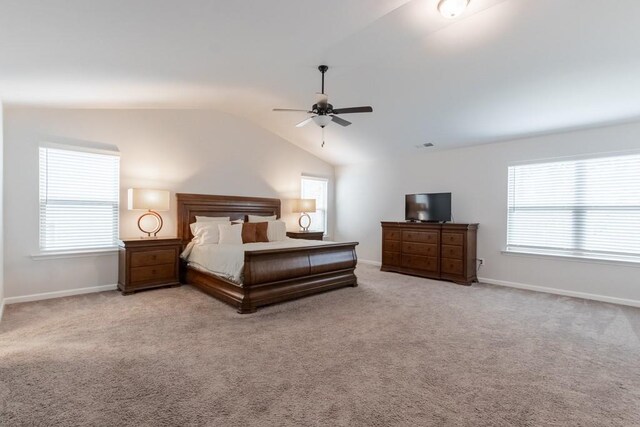 4824 Sultana Way SW, Atlanta, GA 30331 - carpeted bedroom with baseboards, multiple windows, and vaulted ceiling