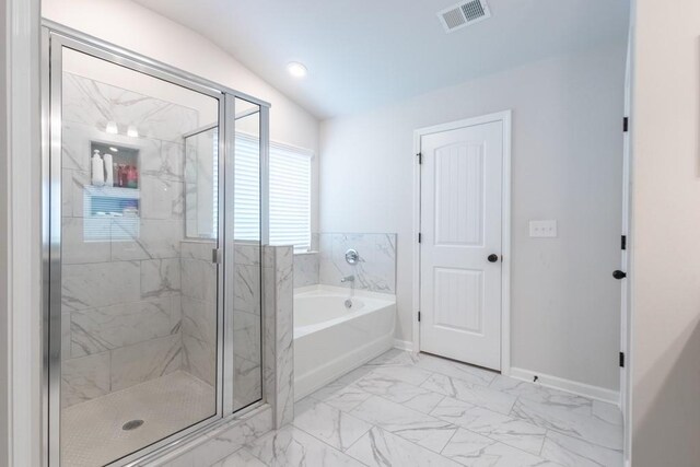 4824 Sultana Way SW, Atlanta, GA 30331 - bathroom with a marble finish shower, lofted ceiling, marble finish floor, a garden tub, and visible vents