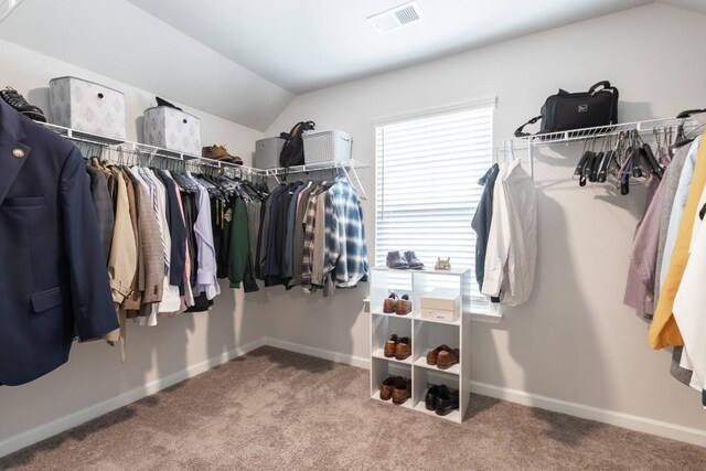 4824 Sultana Way SW, Atlanta, GA 30331 - walk in closet featuring carpet floors, vaulted ceiling, and visible vents