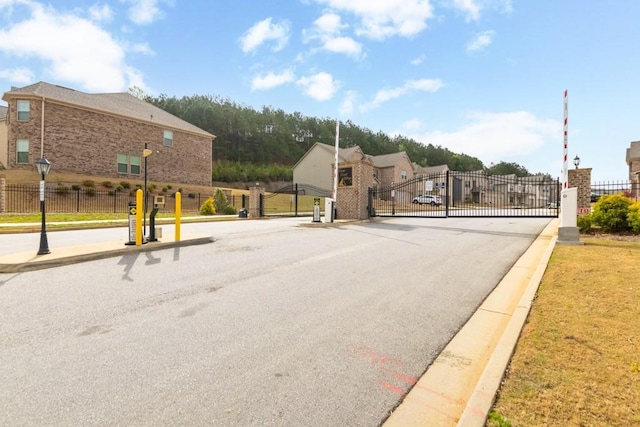 4824 Sultana Way SW, Atlanta, GA 30331 - view of road with a gate, a gated entry, and curbs