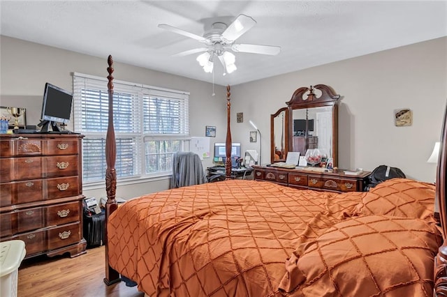 bedroom featuring ceiling fan and light hardwood / wood-style flooring