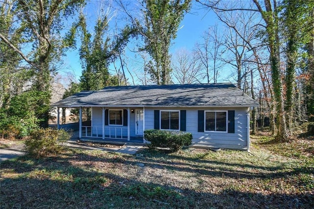 ranch-style house featuring a porch