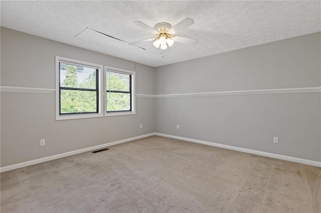 4811 Nevilly Way, Marietta, GA 30066 - spare room featuring carpet flooring, baseboards, visible vents, a ceiling fan, and a textured ceiling