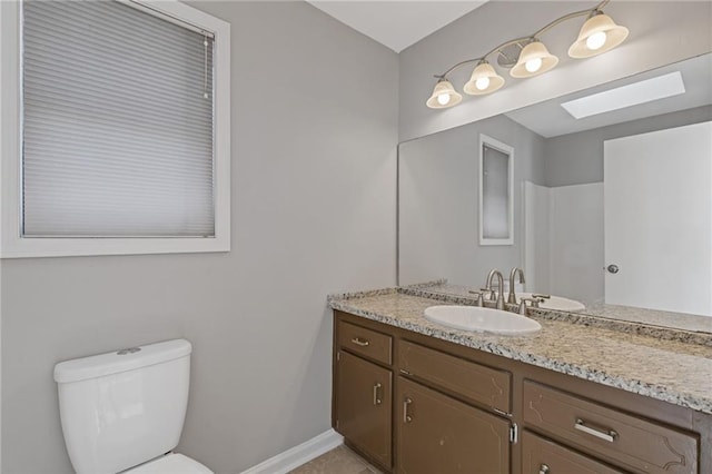 4811 Nevilly Way, Marietta, GA 30066 - bathroom with baseboards, toilet, and vanity
