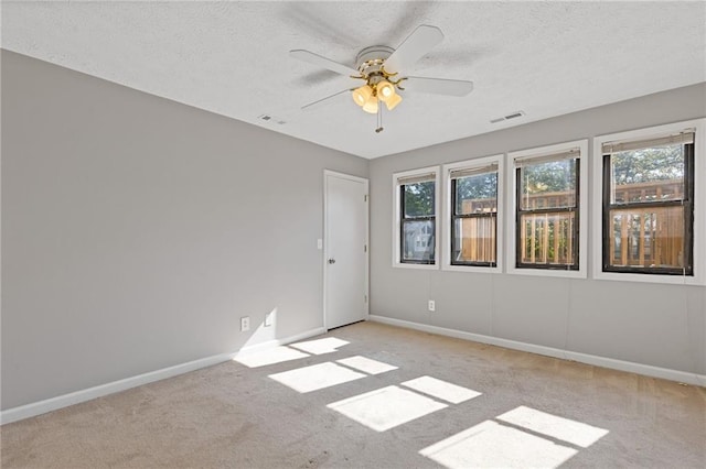 4811 Nevilly Way, Marietta, GA 30066 - carpeted spare room with a wealth of natural light, visible vents, and a textured ceiling