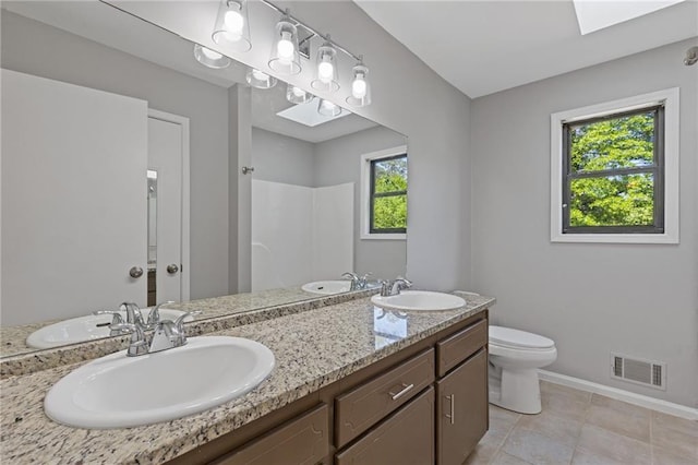 4811 Nevilly Way, Marietta, GA 30066 - bathroom featuring visible vents, toilet, baseboards, and a sink