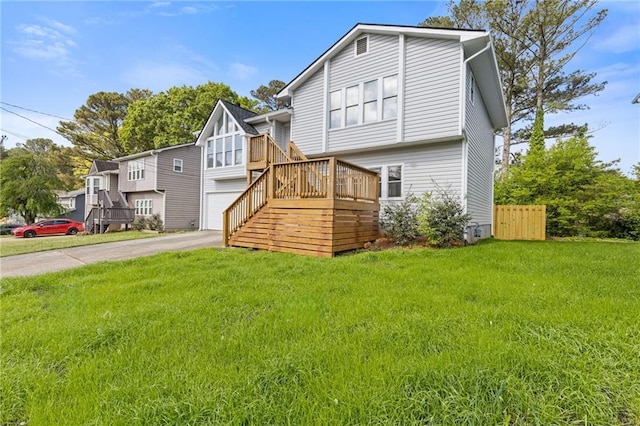 4811 Nevilly Way, Marietta, GA 30066 - back of property with stairway, driveway, and a lawn