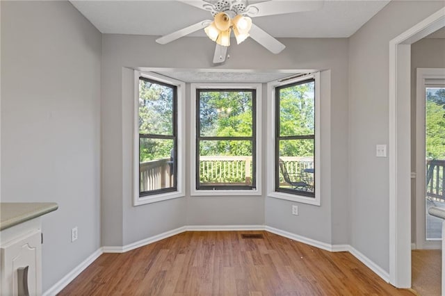 4811 Nevilly Way, Marietta, GA 30066 - unfurnished dining area featuring wood finished floors, a ceiling fan, visible vents, and baseboards