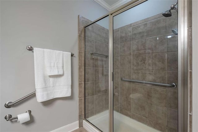 2304 Village Blvd, Rome, GA 30161 - bathroom featuring ornamental molding, a stall shower, and baseboards